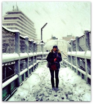 So is snow the same in Tokyo? Kind of, except everyone carries see-through plastic umbrellas! Jess in Tokyo's first February snowfall. Photo credit: Hiro Awanohara